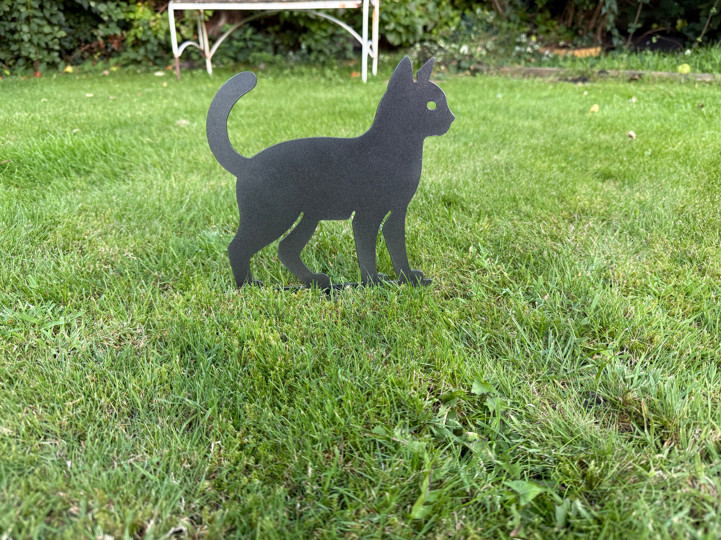 Metal cat with stake for ground